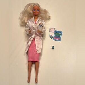 1980s barbie wearing the 1988 Doctor Barbie outfit.